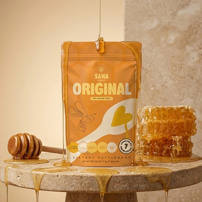 Sana VitaHoney Original Spoon package with honeycomb and honey dripper on a stone surface.